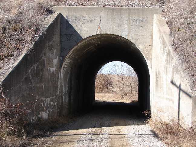 A road tunnel under a railroad, located in rural Missouri